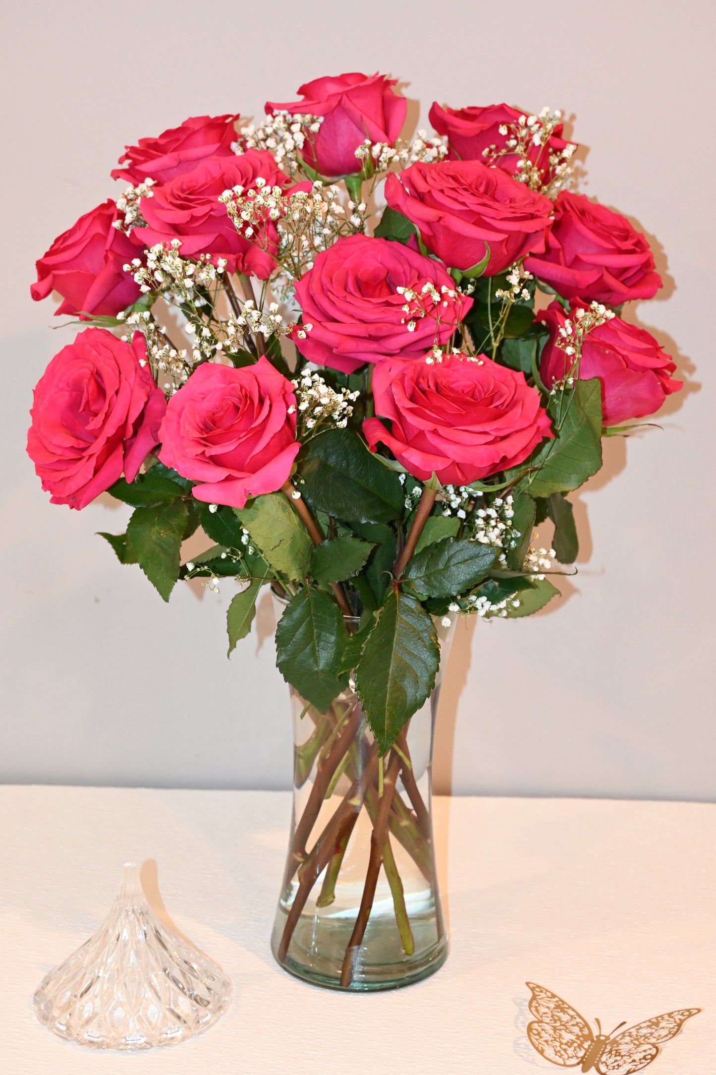 12 Hot pink roses